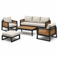 Conjunto de jardín de metal y madera con cojines beige